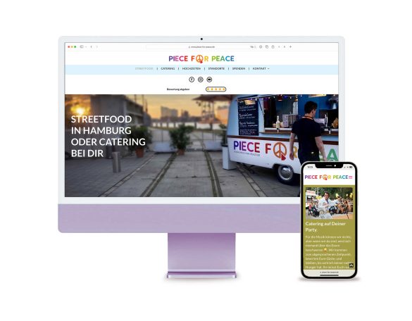 Website-Design mit zwei Geräten: Desktop-Monitor und Smartphone, beide zeigen das gleiche Layout.